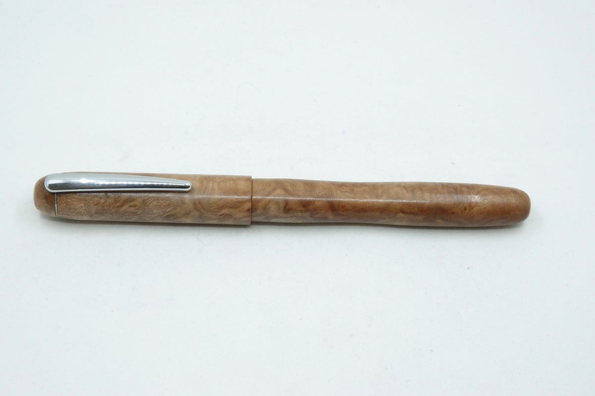 Silver Gimlet Burl with Chrome pocket clip.