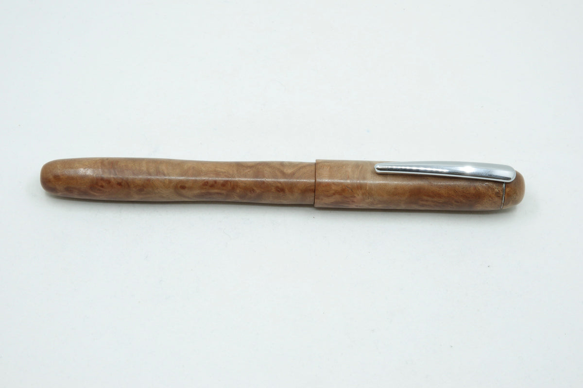 Silver Gimlet Burl with Chrome pocket clip.