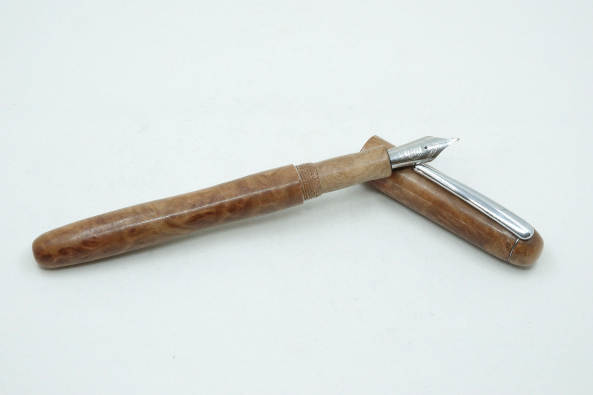 Silver Gimlet Burl with Chrome pocket clip.