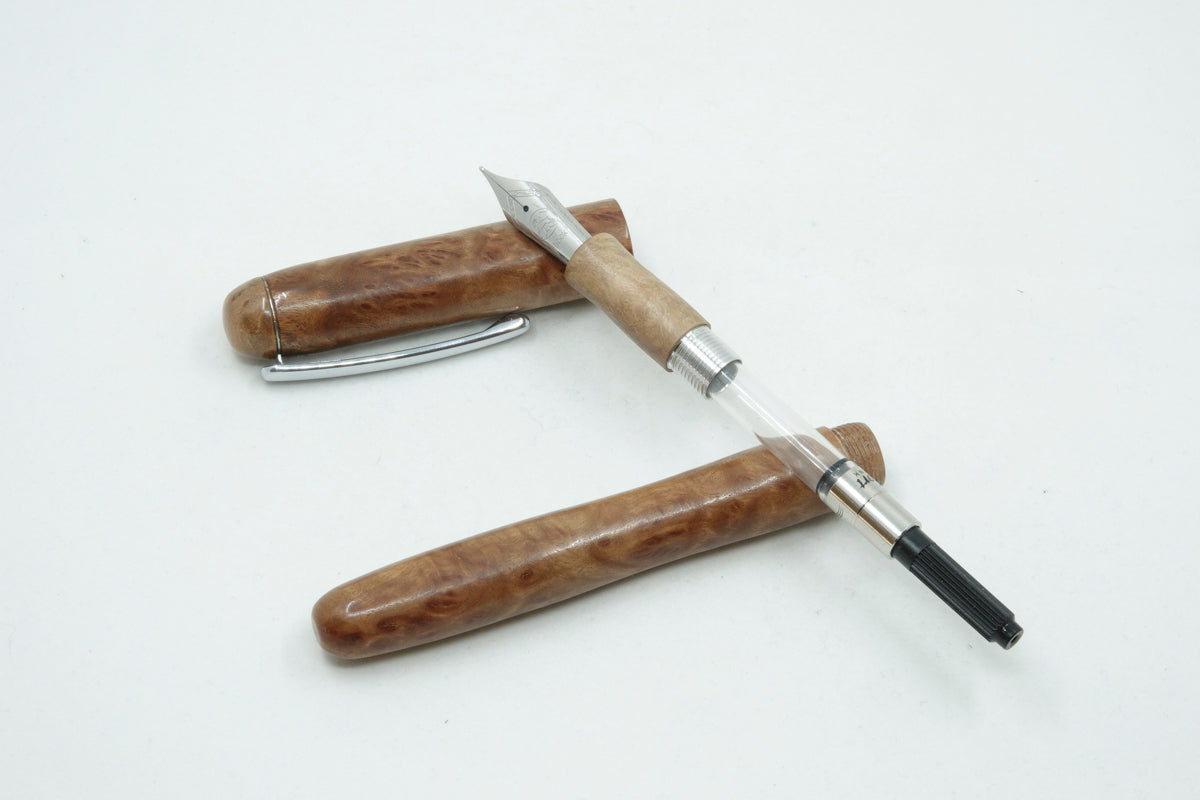 Silver Gimlet Burl with Chrome pocket clip.