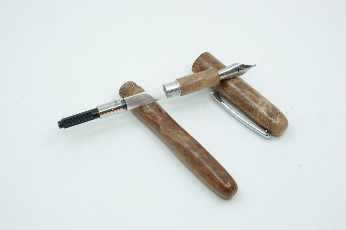 Silver Gimlet Burl with Chrome pocket clip.