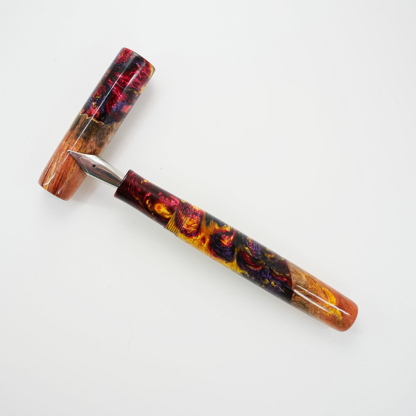 Custom order for Simon Wood Hybrid, Jarrah Burl Gold Digger.