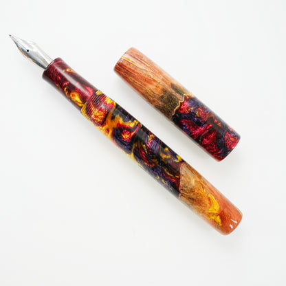 Custom order for Simon Wood Hybrid, Jarrah Burl Gold Digger.